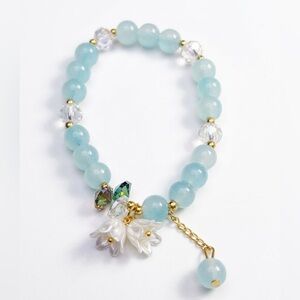 Aquamarine Blue Beaded Bracelet with Floral Charms